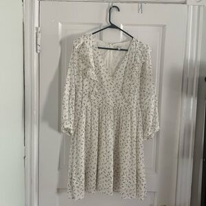 Madewell floral dress. Light material with ruffles on sleeves and at shoulders.